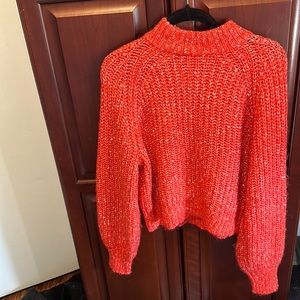 Vibrant orange knitted sweater